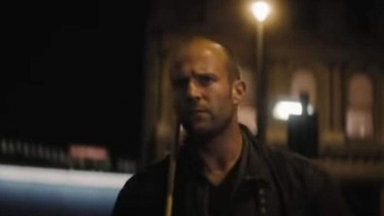 Jason Statham under streetlight