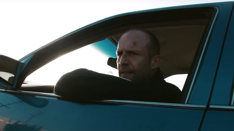 Jason Statham driving