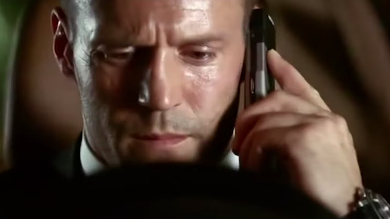 Jason Statham on cellphone