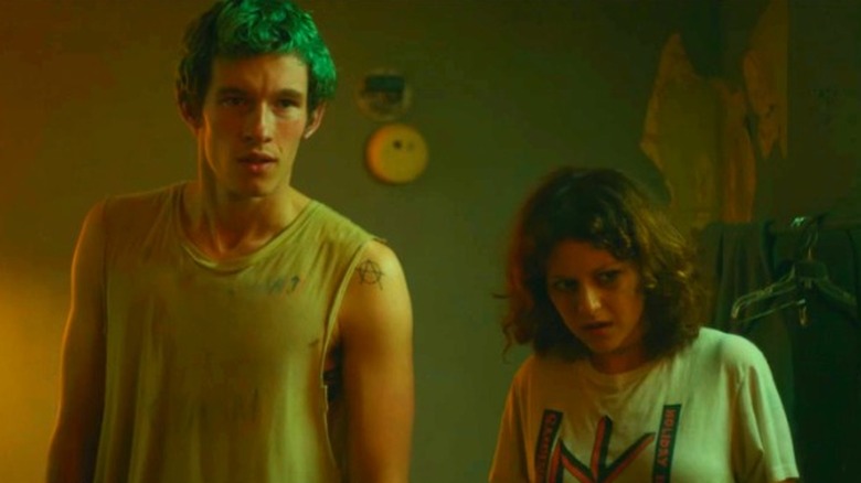 Green-haired man and punk woman together