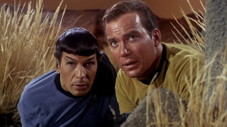 Spock and Kirk hiding