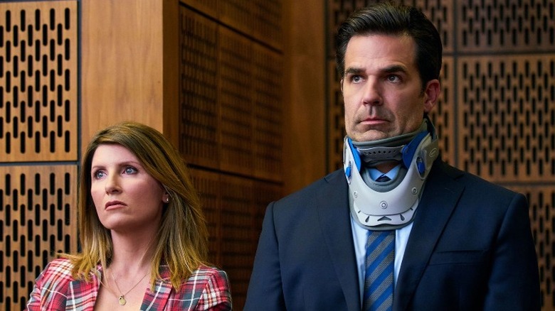 Sharon and Rob wearing a neck brace