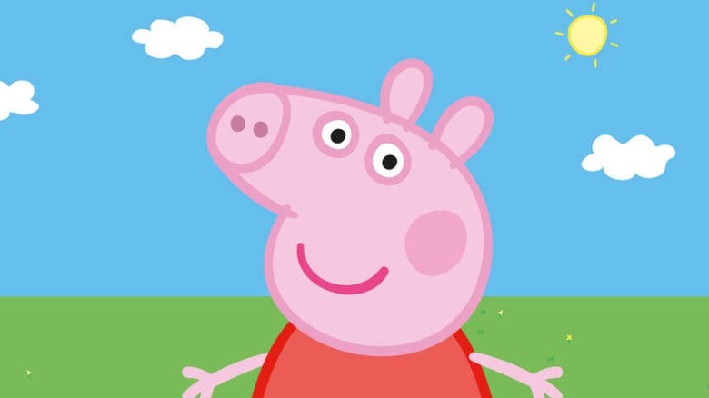 Peppa Pig smiling outdoors