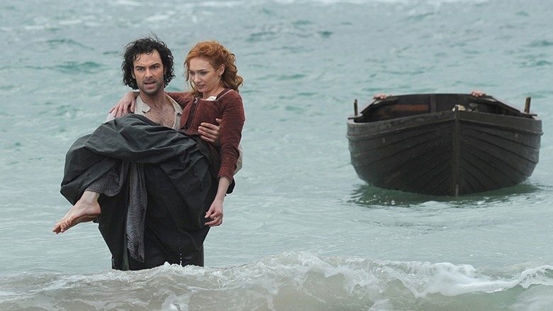 Poldark carrying Demelza in ocean