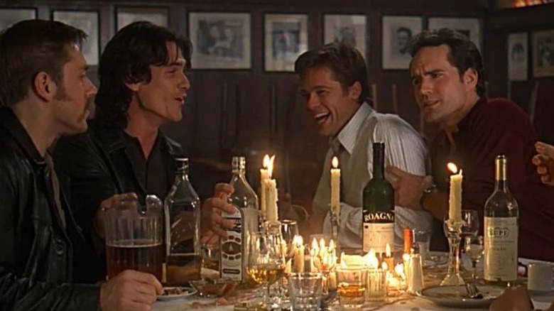 Brad Pitt and others laugh at dinner