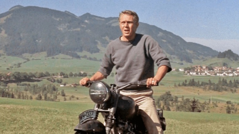 Steve McQueen riding motorcycle