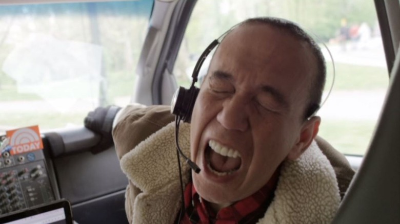 Gilbert Gottfried yelling into headset