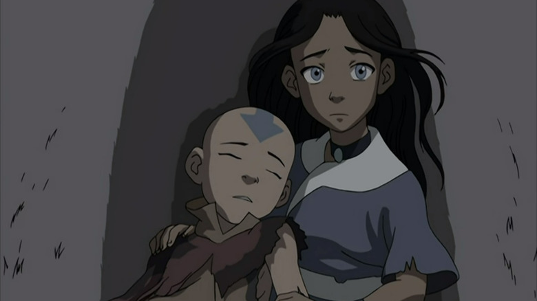 Katara holding Aang