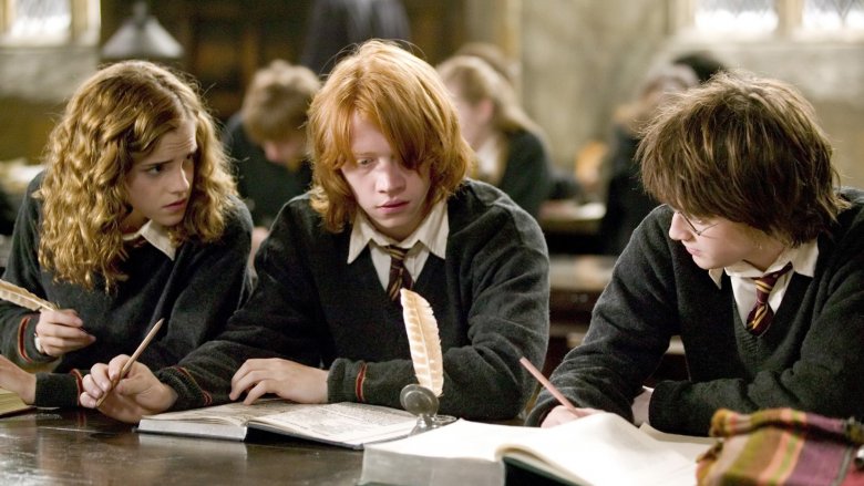 Emma Watson, Rupert Grint, and Daniel Radcliffe in Harry Potter and the Goblet of Fire