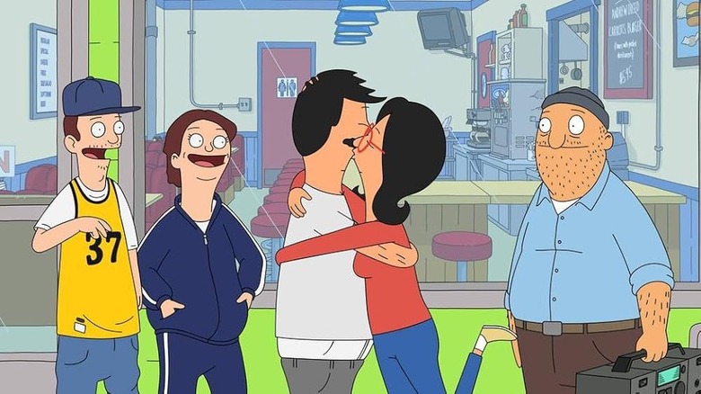 Bob kissing Linda