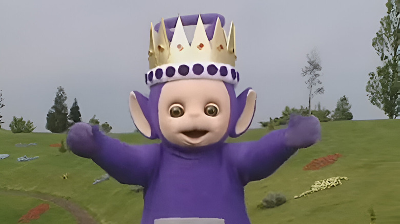 Tinky Winky wearing a crown