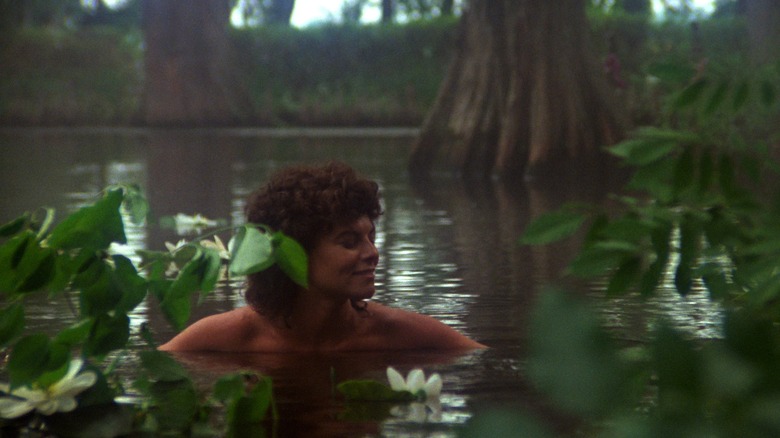 Woman wading in water