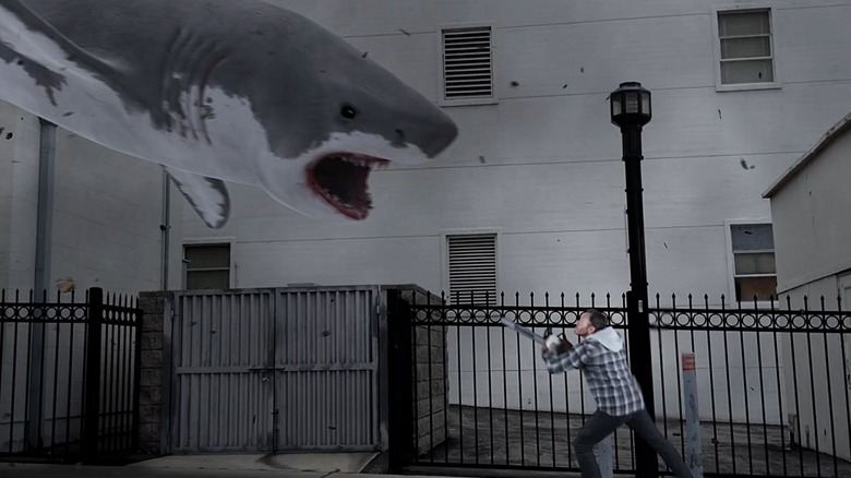 Shark and guy on street