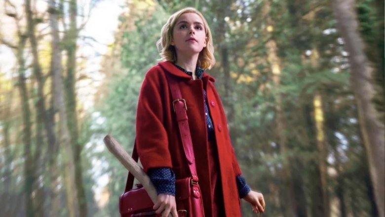 Sabrina in a red coat