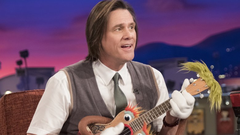 Carrey playing ukelele