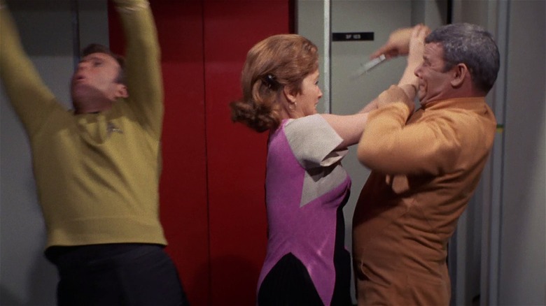 Kirk flails while Janice Lester fights