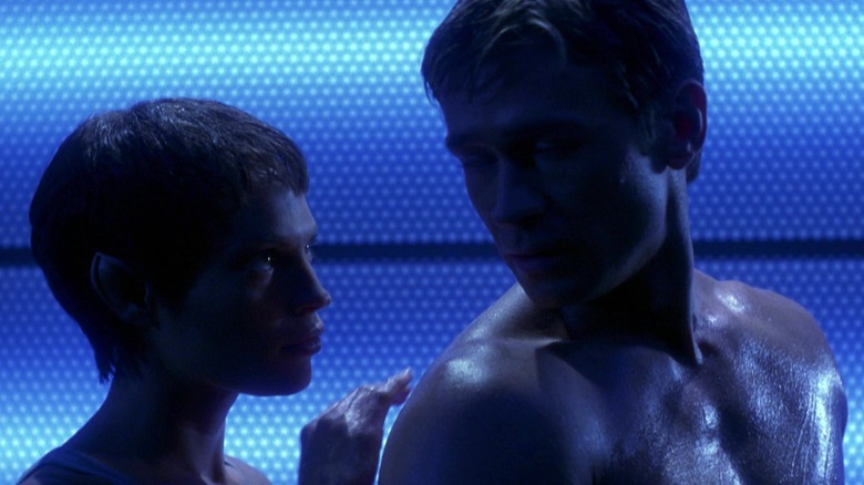 T'Pol oils Trip's skin