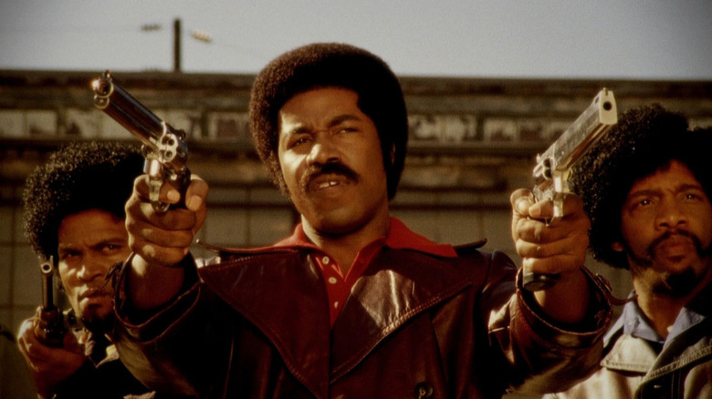 Black Dynamite with two guns