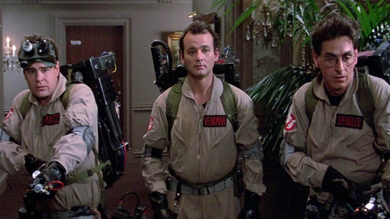 Ray, Peter and Egon prepare their proton packs