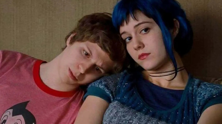 Scott Pilgrim leans his head on Ramona's shoulder