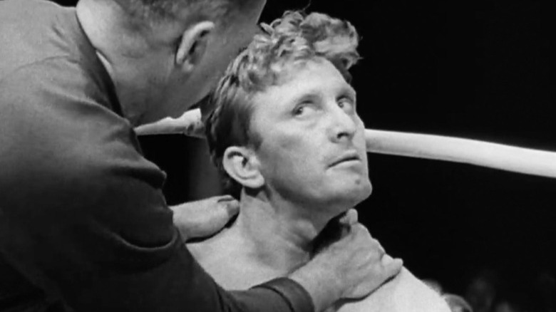 Kirk Douglas receiving treatment