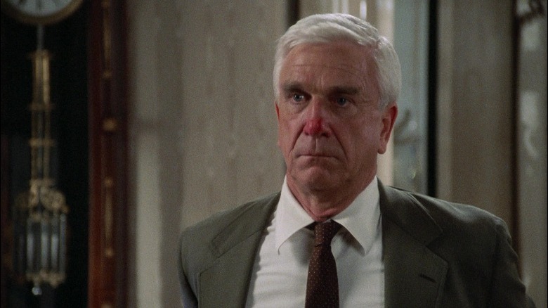 Lieutenant Frank Drebin with a red nose