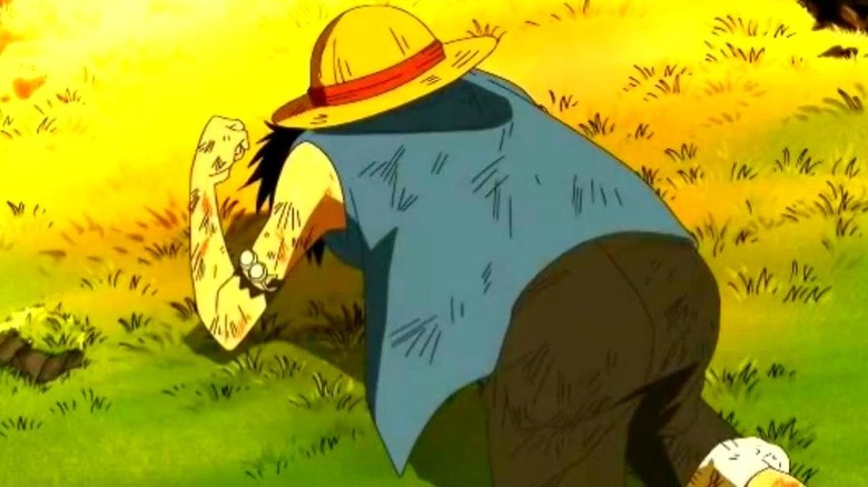 Luffy crying on the ground