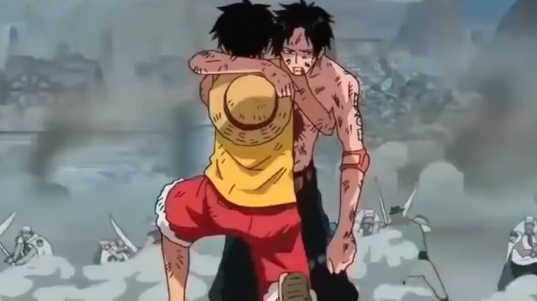 Luffy and Ace embrace