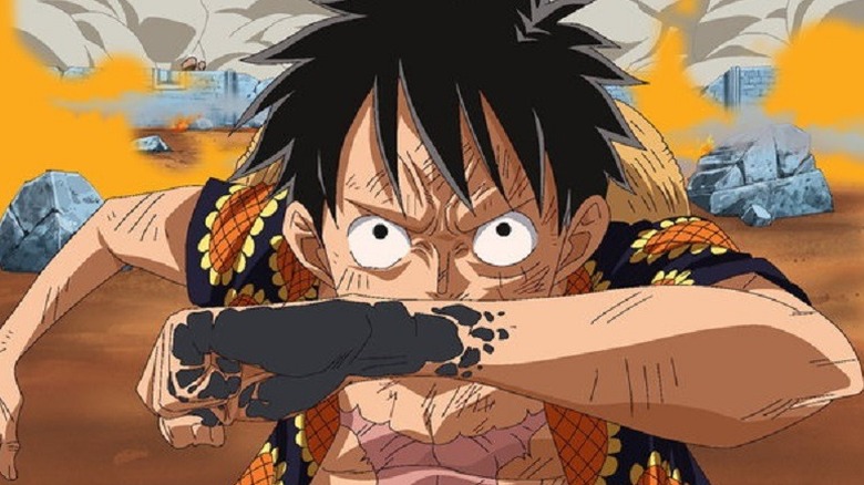 Luffy flexing in shirt