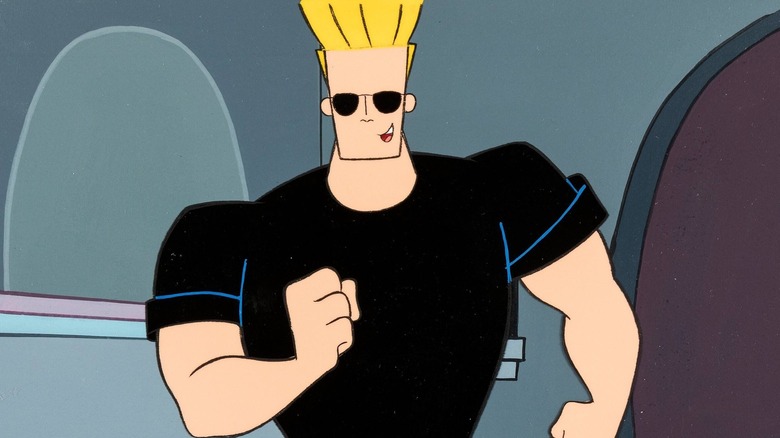 Johnny Bravo walks forward smiling