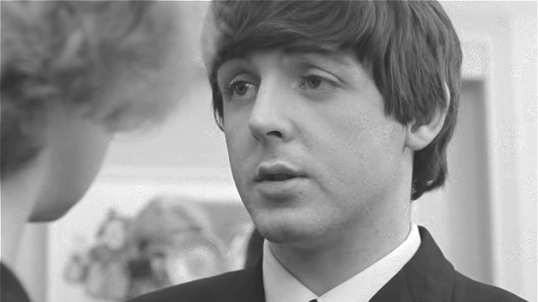 Paul McCartney looking at someone in close-up