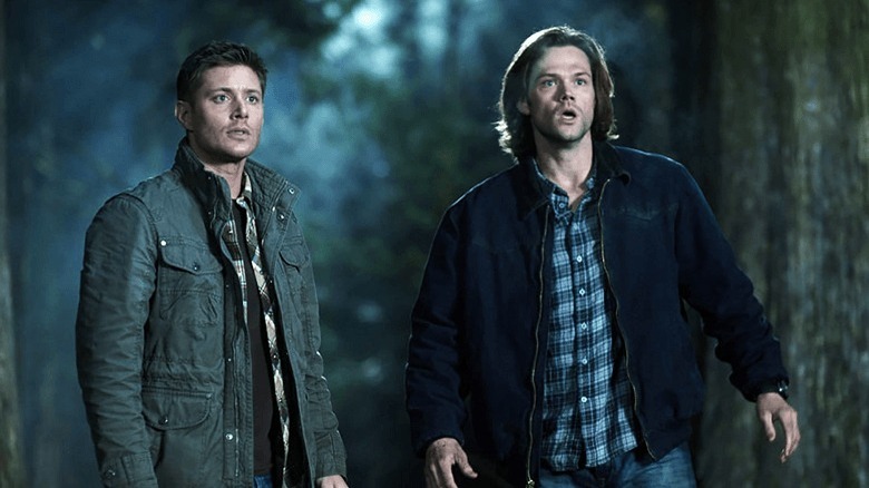 Dean and Sam Winchester outside