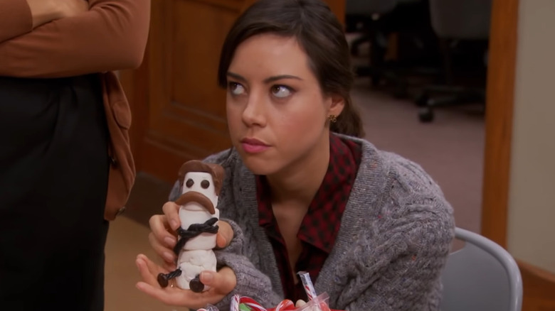 April Ludgate holds a marshmallow Ron Swanson