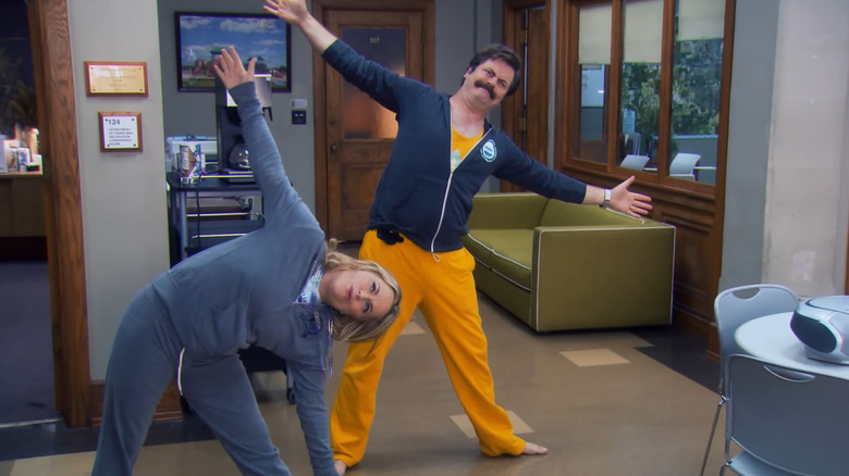 Leslie Knope and Ron Swanson do yoga