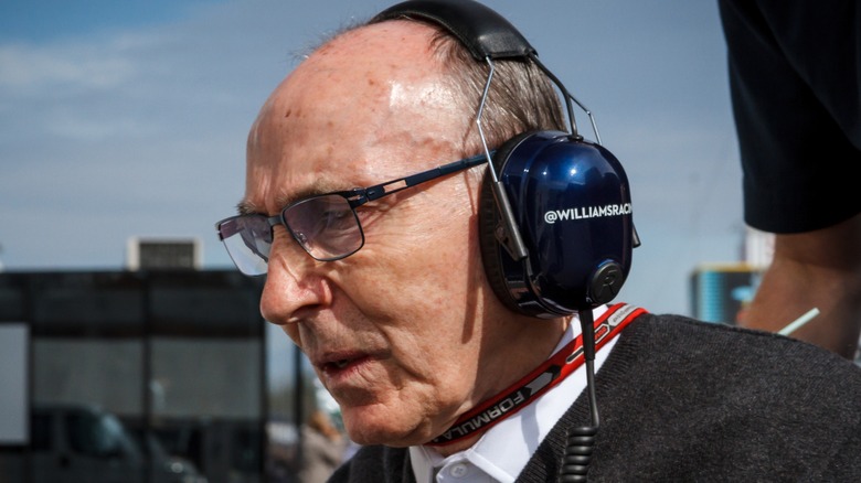 Sir Frank Williams with headphones