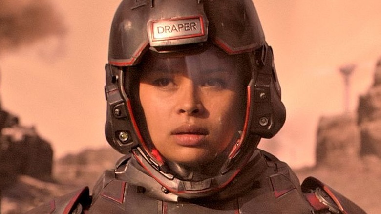 Bobbie Draper	wearing space helmet