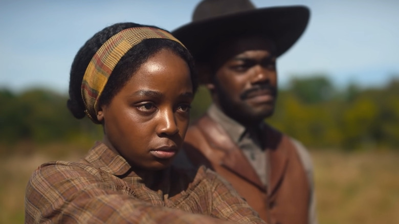 Cora and Caesar standing in field