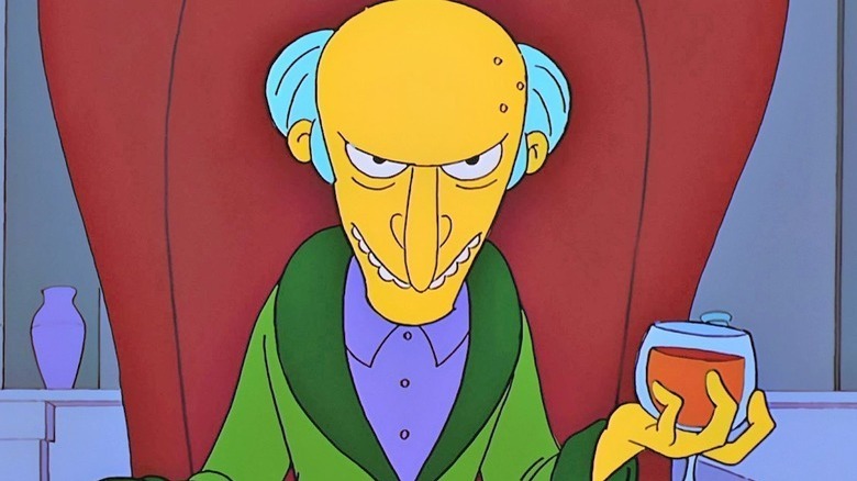 Mr Burns menacing holding drink