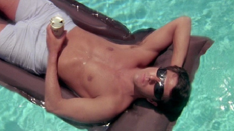 Dustin Hoffman floating in pool
