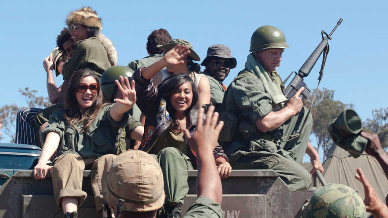 The Sapphires are escorted into Vietnam with American soldiers