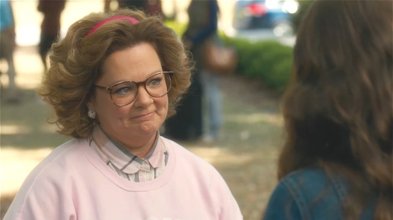 Melissa McCarthy wearing a pink sweater