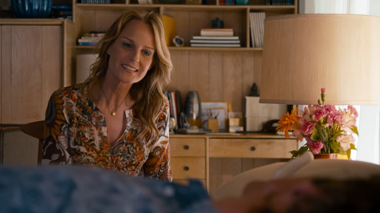 Helen Hunt smiles at a bed-ridden John Hawkes