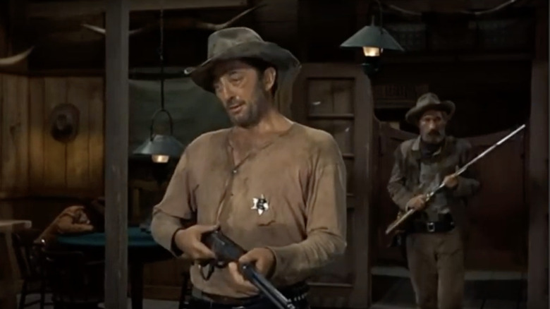 Sheriff J.P. Harrah with rifle