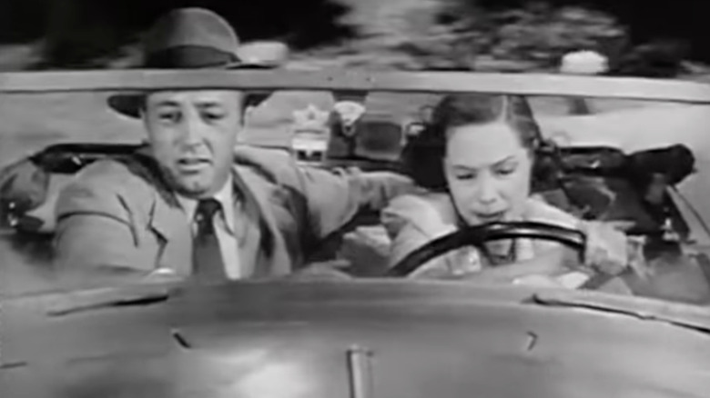 Duke Halliday and Joan Graham in car