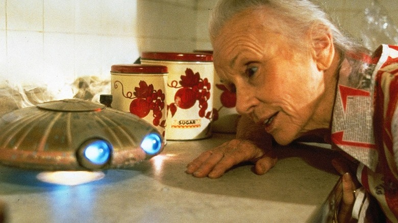 Faye and a Fix-It in "Batteries Not Included" (1987)