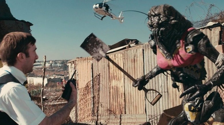 Wikus confronts an alien in "District 9" (2009)