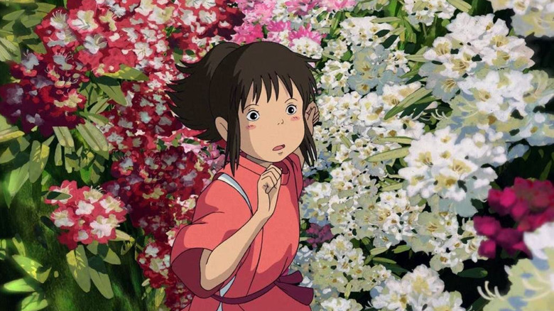 Chihiro running through flowers