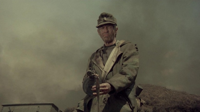 German soldier holding submachine gun