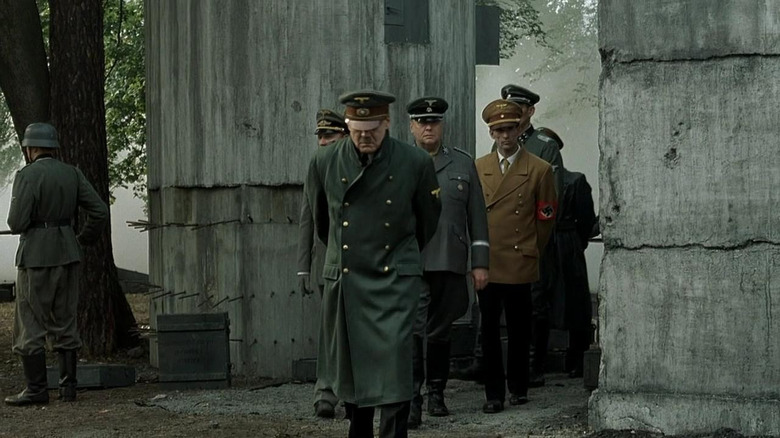 Adolf Hitler walking near bunker