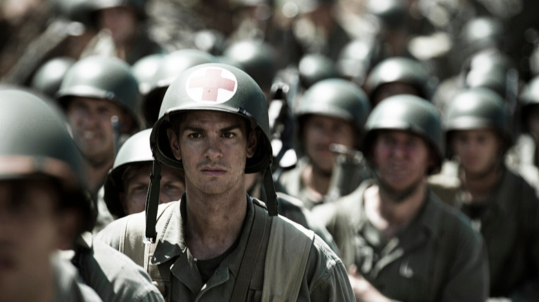 Doss marching with other soldiers